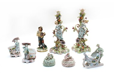 Lot 465 - A pair of Sitzendorf design figural candlesticks