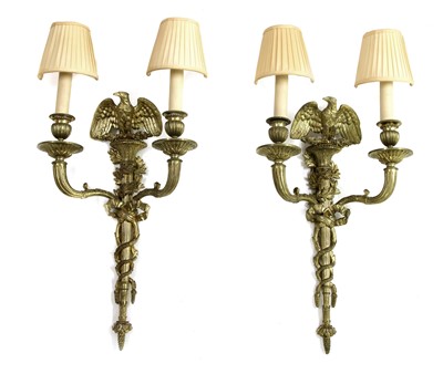 Lot 246 - A pair of Empire design gilt metal wall lights