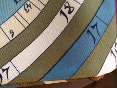 Lot 134 - An Hermès 'Dies et Hore' silk scarf