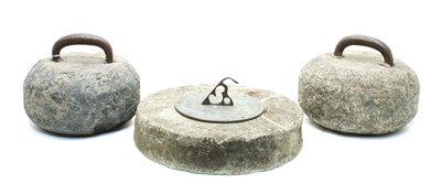 Lot 510 - Two Scottish curling stones and a sundial