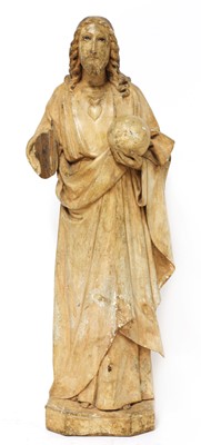 Lot 702 - A Continental carved and painted pine figure of Christ as Salvator Mundi