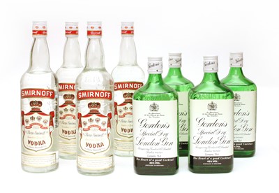 Lot 1000 - Gordon's gin, four bottles and Smirnoff vodka