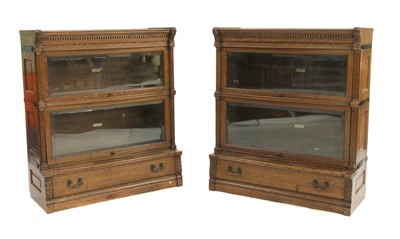 Lot 802 - A pair of Globe Wernick sectional bookcases