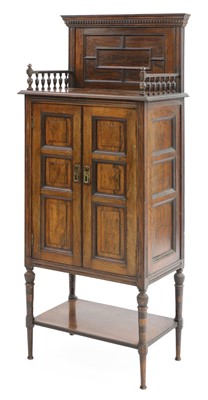 Lot 26 - A walnut cabinet