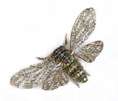 Lot 363 - A white gold black diamond, diamond and fancy diamond, bee brooch