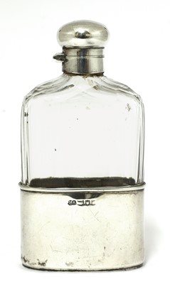 Lot 4 - An Edwardian cut-glass and silver-mounted hip flask