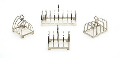 Lot 487 - A pair of silver four division toast racks