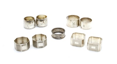 Lot 311 - Three pieces of silver napkin rings