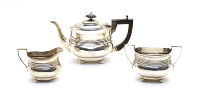 Lot 300 - An Edwardian silver monogrammed three piece tea set