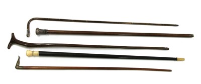 Lot 604 - A 19th century ladies cane with silver horseshoe crest