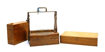 Lot 267 - A 19th century tantalus frame with folding sides