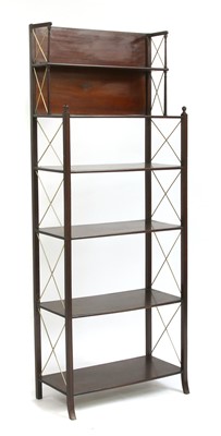 Lot 890 - A Regency-style mahogany open bookshelf