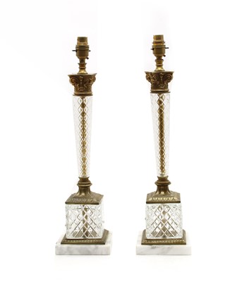 Lot 296 - A pair of reticulated glass and brass table lamps