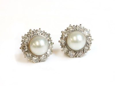 Lot 229 - A pair of cultured pearl and diamond cluster earrings