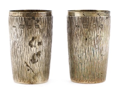 Lot 196 - A pair of silver beakers
