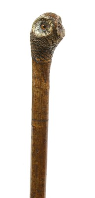 Lot 759 - A Swaine & Adeney owl walking stick