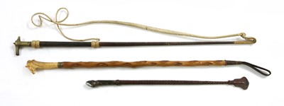 Lot 765 - Three riding crops