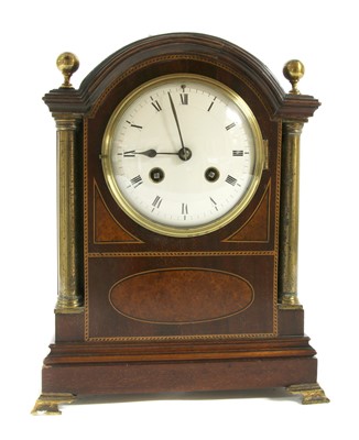 Lot 281A - An Edwardian mahogany and brass crossbanded mantel clock