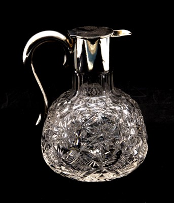 Lot 364 - A silver and cut glass jug