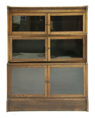 Lot 772 - An oak sectional bookcase 'The Oxford'