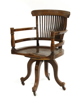 Lot 10 - A revolving desk chair