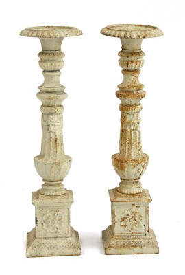 Lot 539 - A pair of cast iron pricket candlesticks