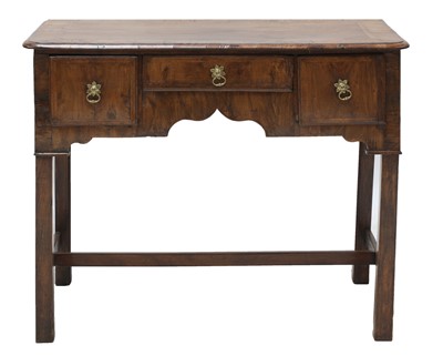 Lot 300 - An 18th century walnut lowboy