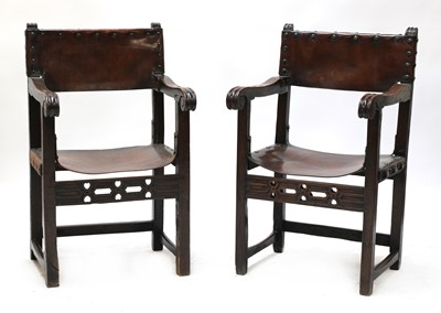 Lot 115 - A near pair of Spanish oak armchairs