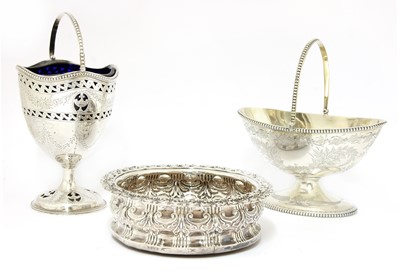 Lot 28 - Two Victorian silver sugar baskets