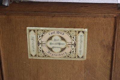 Lot 42 - A German carved oak side cabinet