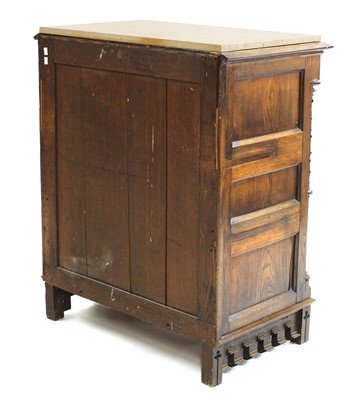 Lot 42 - A German carved oak side cabinet