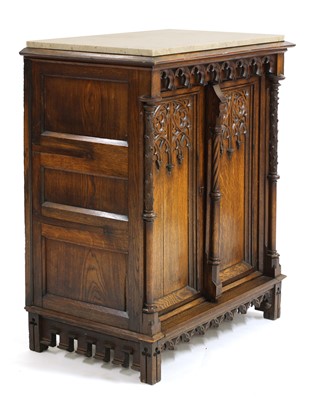 Lot 42 - A German carved oak side cabinet