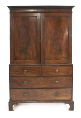 Lot 540 - A George III mahogany linen press