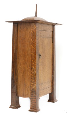 Lot 198 - A rare Arts and Crafts oak architectural clock, designed by CFA Voysey, c. 1902