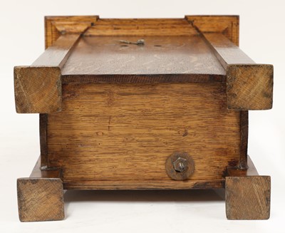 Lot 198 - A rare Arts and Crafts oak architectural clock, designed by CFA Voysey, c. 1902