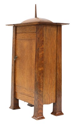 Lot 198 - A rare Arts and Crafts oak architectural clock, designed by CFA Voysey, c. 1902