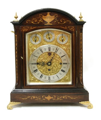 Lot 288 - An Edwardian inlaid mahogany three-train bracket clock