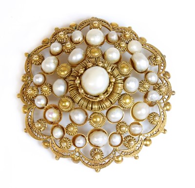 Lot 208 - A Continental gold-mounted pearl, shield-form, cluster brooch/pendant