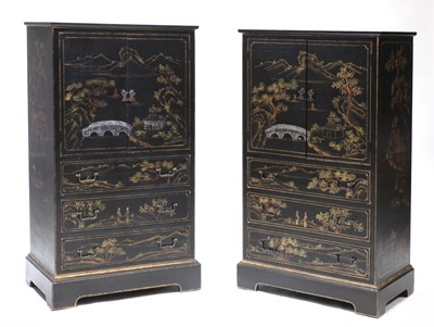 Lot 48 - A pair of chinoiserie ebonised, painted and gilt cabinets
