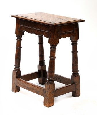 Lot 124 - An oak joint stool