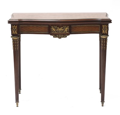 Lot 396 - A French bois satiné and parquetry fold-over card table