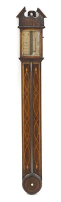 Lot 247 - A strung mahogany stick barometer