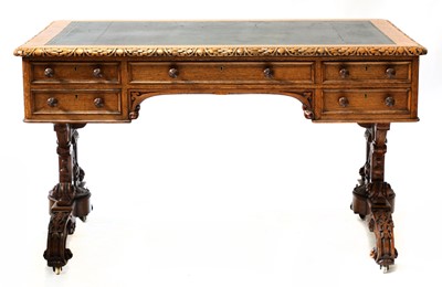 Lot 66 - A Victorian Gothic oak library table