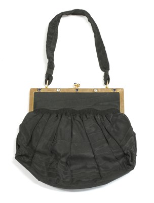 Lot 73 - An Edwardian 9ct gold sapphire and diamond set watermark black taffeta evening bag, by Asprey & Co.