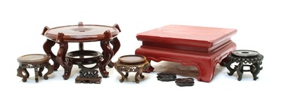 Lot 311 - A collection of Chinese wood stands
