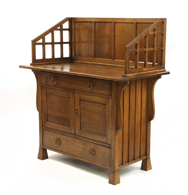 Lot 188 - An Arts and Crafts oak cabinet