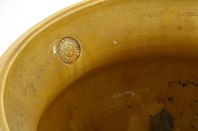 Lot 6 - A pair of Doulton Lambeth stoneware jardinières on stands