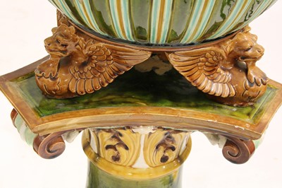 Lot 6 - A pair of Doulton Lambeth stoneware jardinières on stands