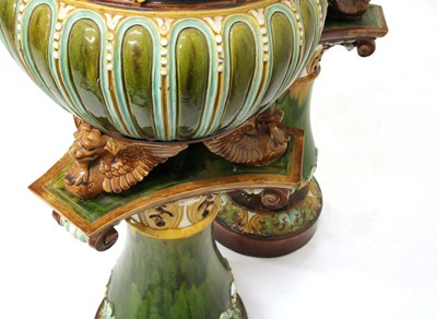 Lot 6 - A pair of Doulton Lambeth stoneware jardinières on stands