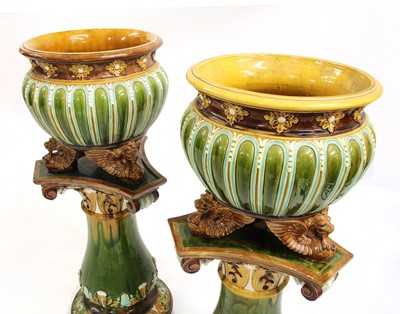 Lot 6 - A pair of Doulton Lambeth stoneware jardinières on stands